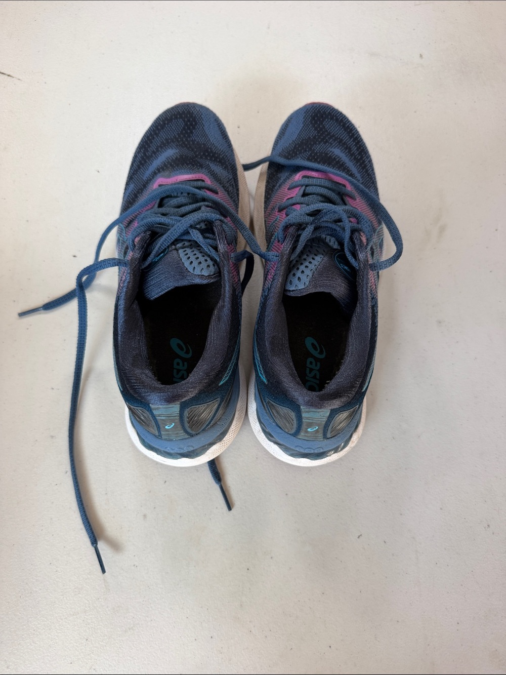 ASICS woman’s Navy Blue Sneakers with Pink Accents